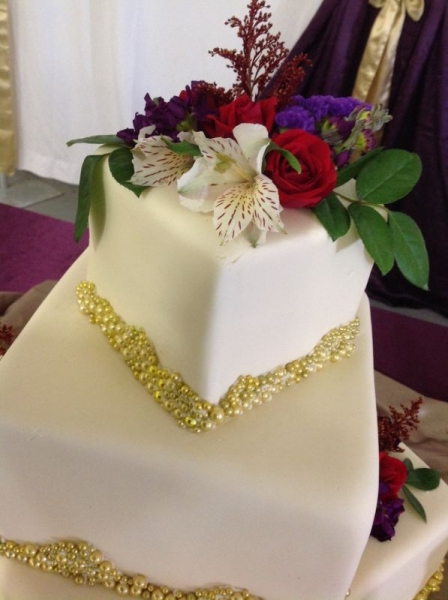 2 tier white gold trim cake