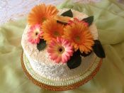 white cake orange pink flowers